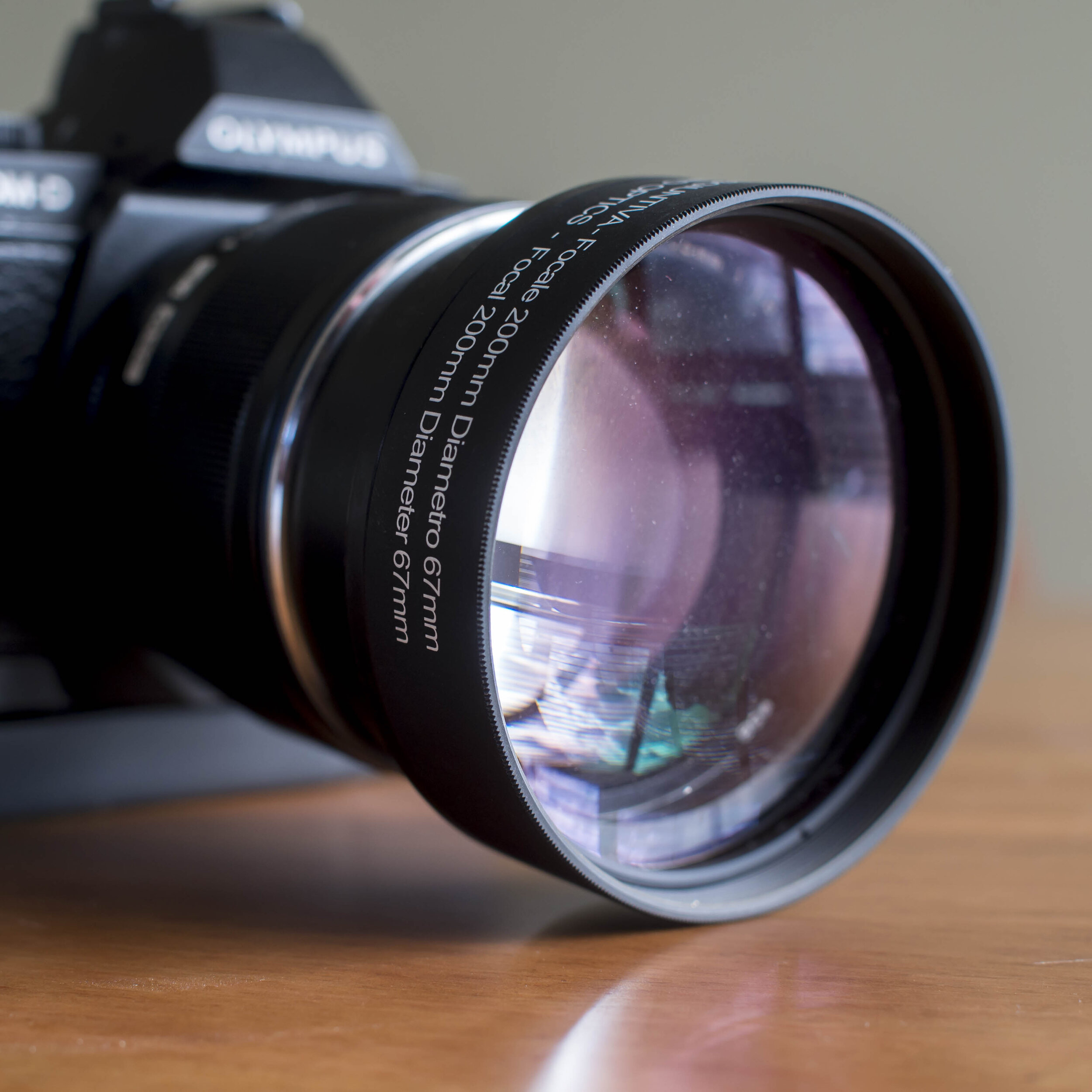 Once part of a jewellers specialised macro kit, this twin lens diopter is extremely heavy, but quite sharp.