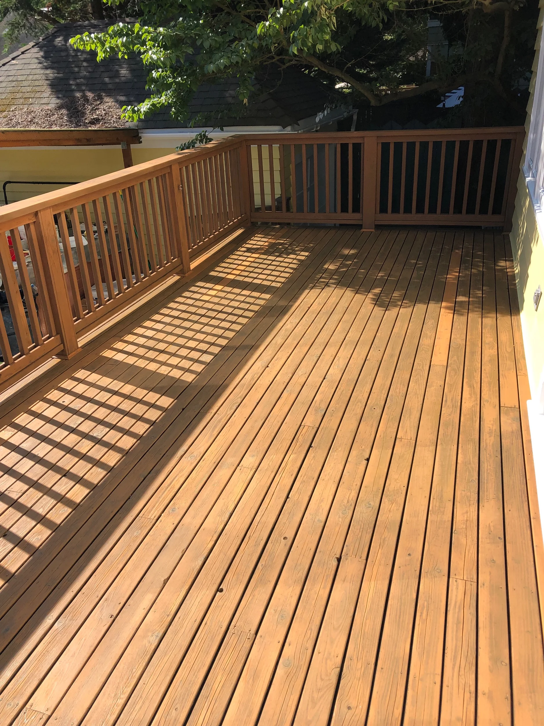 Sanded and stained old wooden Deck.