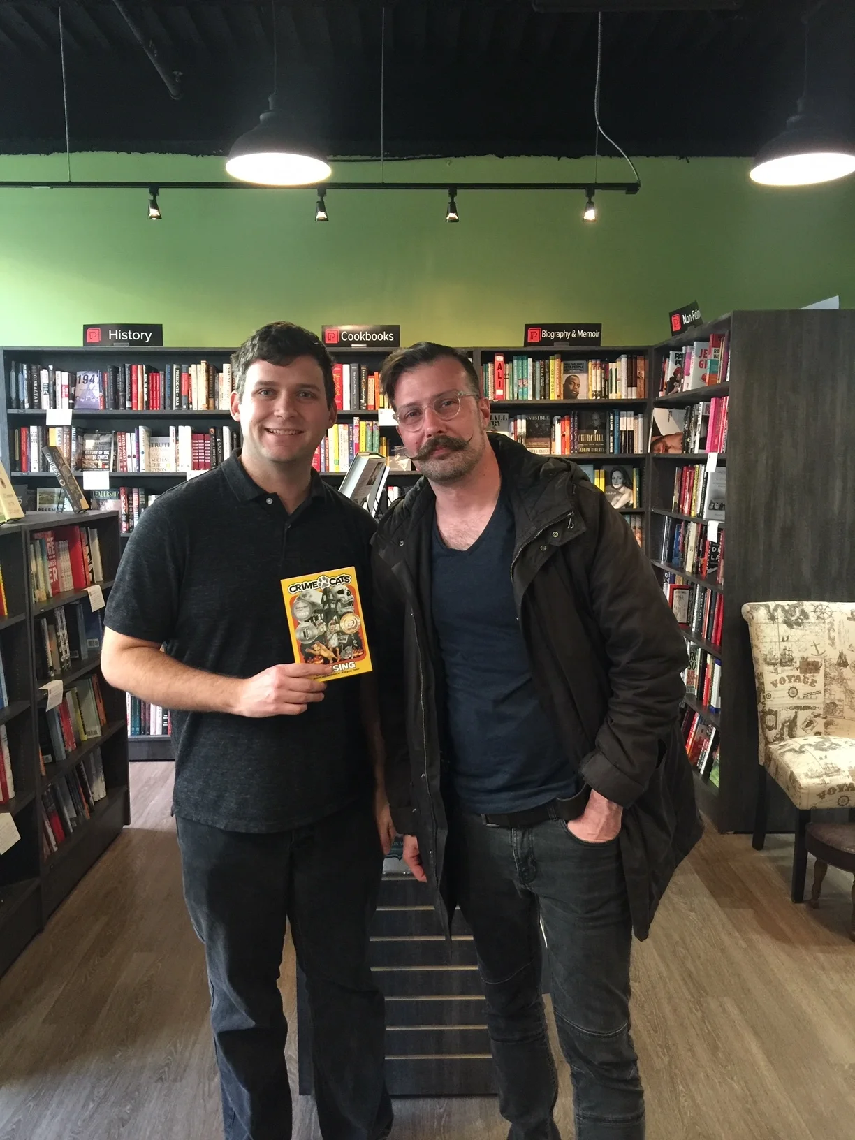 Owner David Baker and “Crime Cats” writer Wolfgang Parker