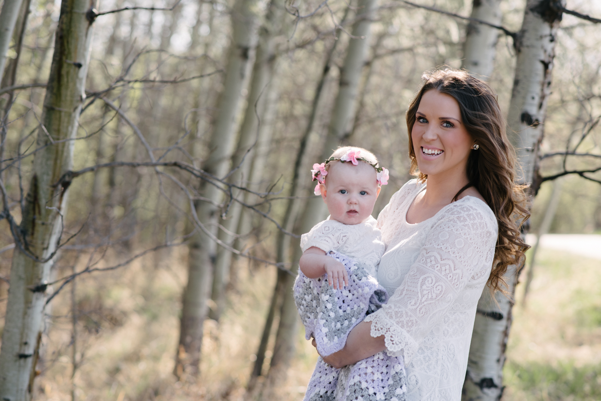 mom holding baby, trees, st. albert family photographer