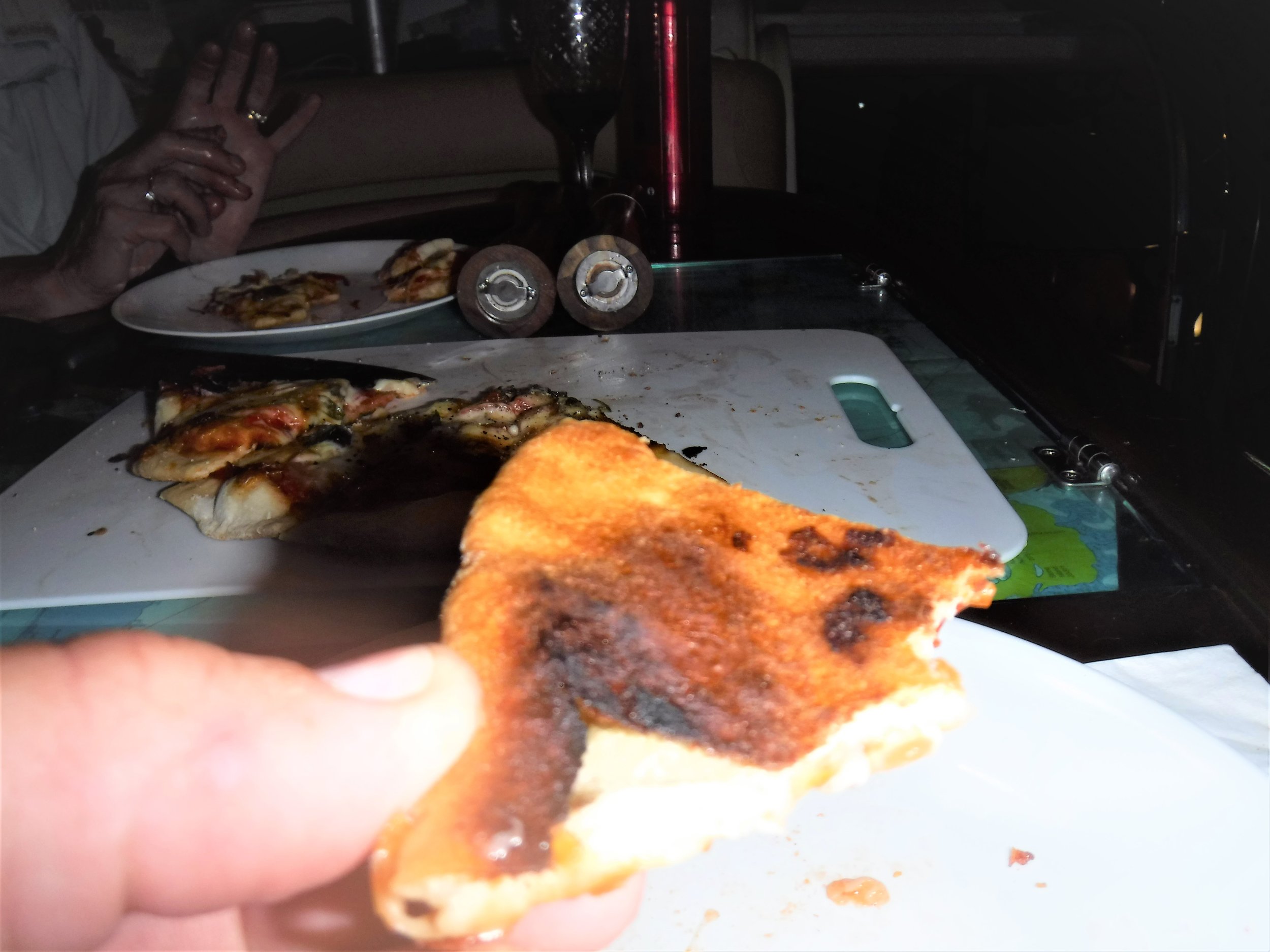What a really good pizza crust should look like underneath. These little BBQ's really get hot.