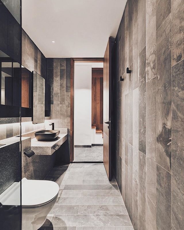 LKT project/ Powder room. Semi-rustic stone tiles with terrazzo and  walnut veneer.