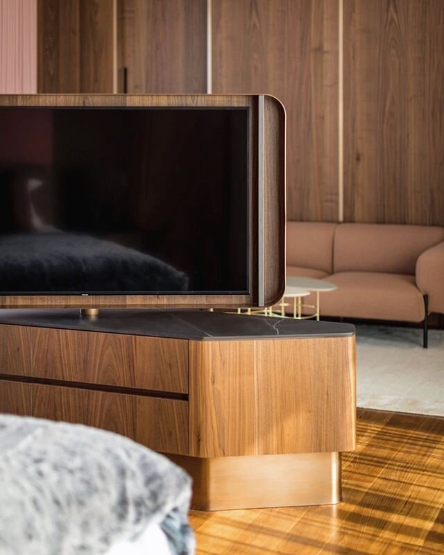 Bespoke TV console with rotatable TV for the master bedroom.
