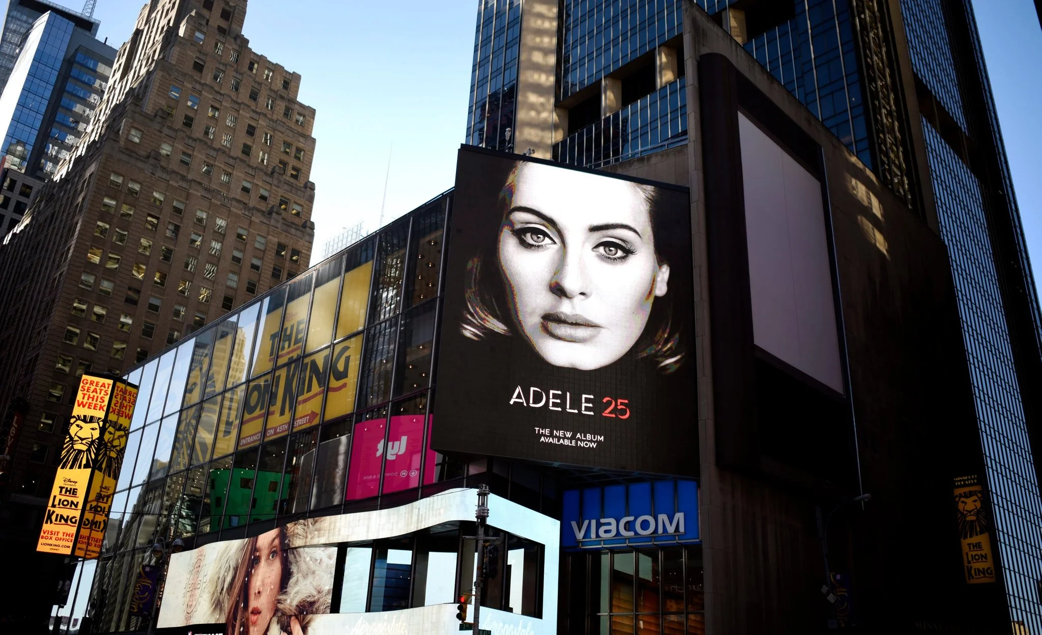 here's adele's face on a billboard in new york city. image from the new york times.