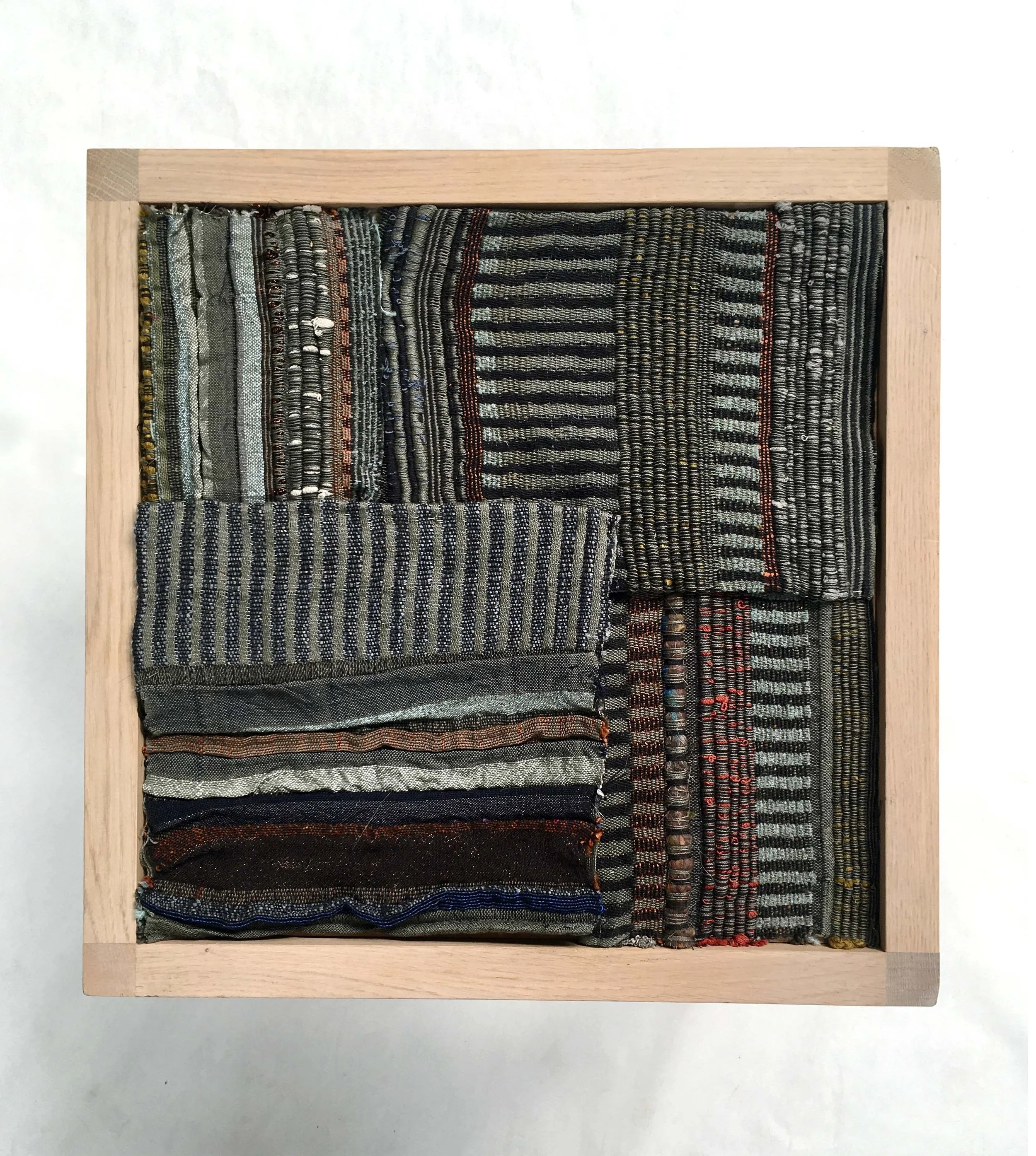 handwoven textiles on traditional wooden loom