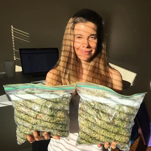Dr. Patrick with bags of sprouts!