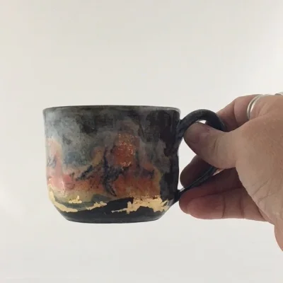 Mug10holding2.JPG