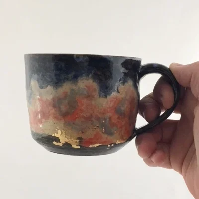 Mug4holding3.JPG