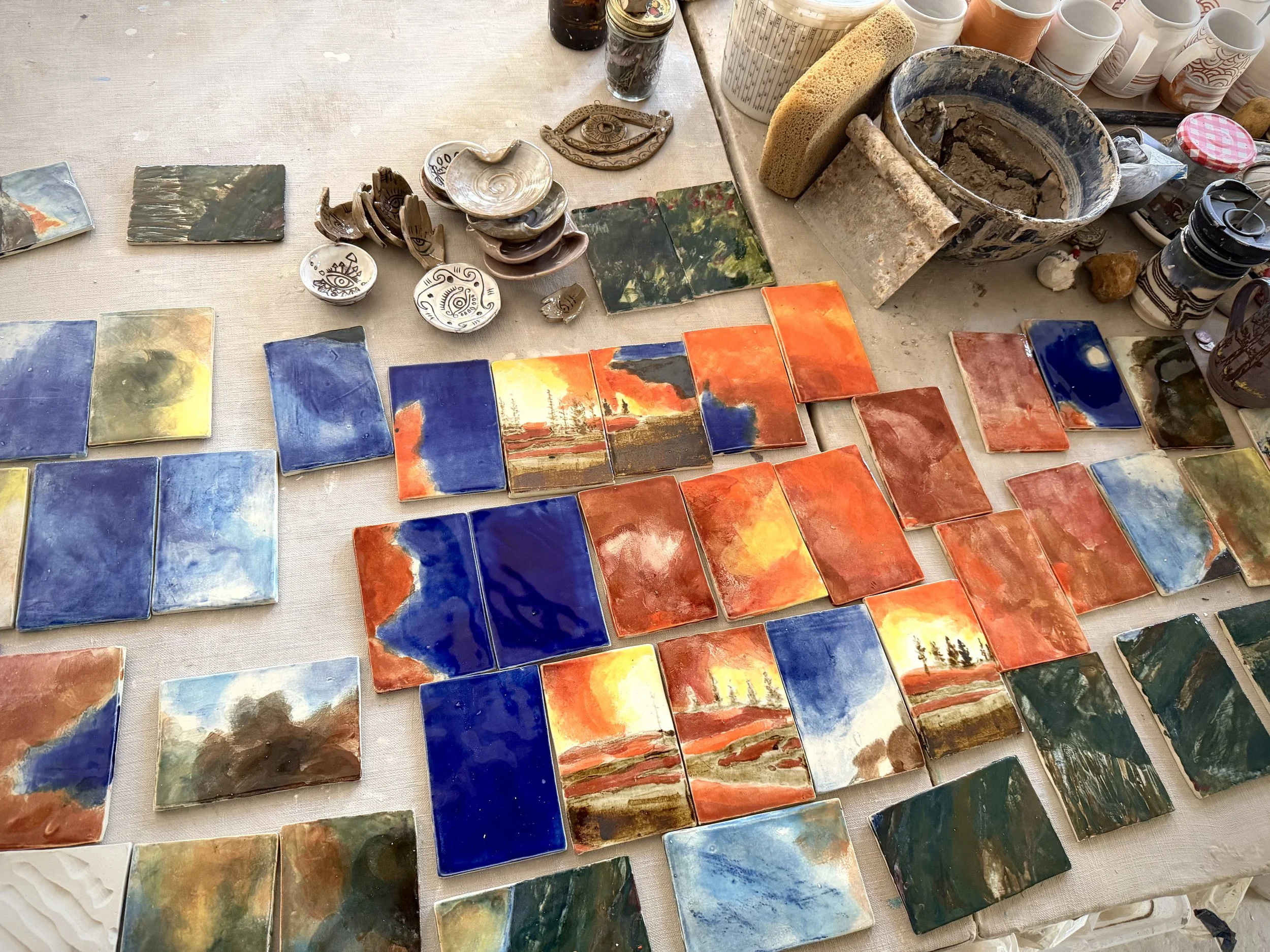 Wildfire tile paintings in studio.jpg