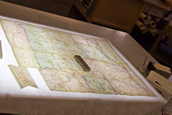 The map was repaired on a light box so I could match the panels up precisely. 