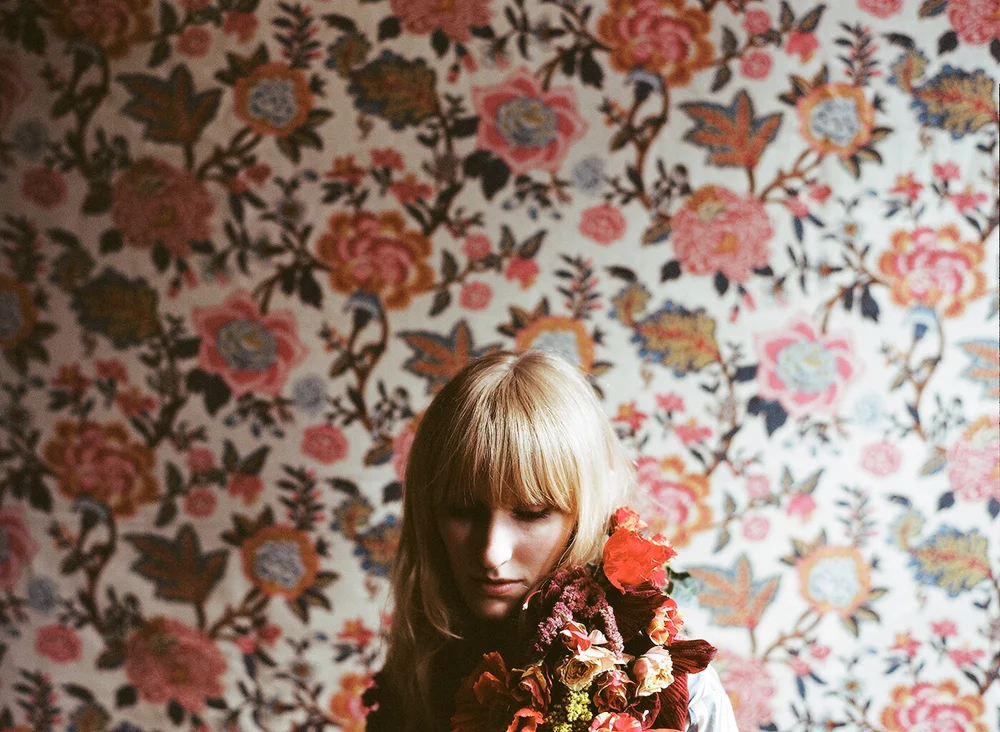 Lo, how a rose e'er blooming