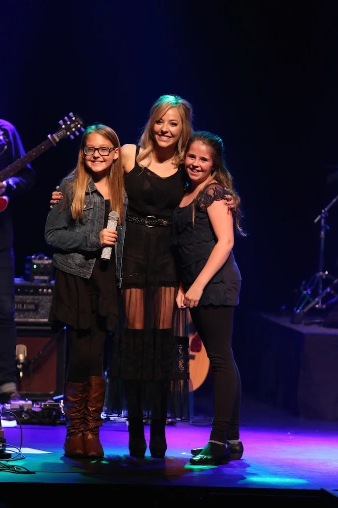 Mackenzie Porter invited me and my friend Sophie up onstage at her concert in Medicine Hat, AB 2015. Check out my u-tube channel to see me taking Mackenzie up on her gracious invitation for me to share my story.