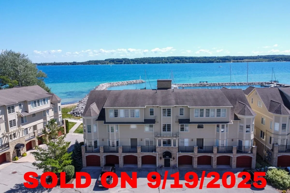 710 N Dockside Circle, Unit F-2, Suttons Bay, MI – Direct Waterfront Condominium in the Village of Suttons Bay SOLD by Jonathan Oltersdorf, Oltersdorf Realty (1).jpg