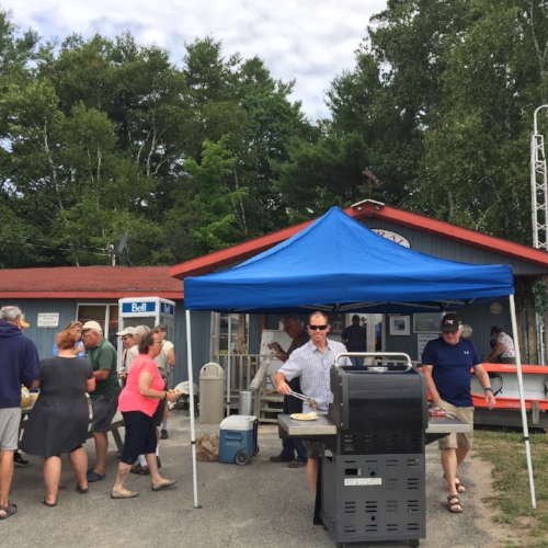 Our treasurer, Dan Walda, serving up pulled pork and hotdogs for hlsmr's sold out bbq