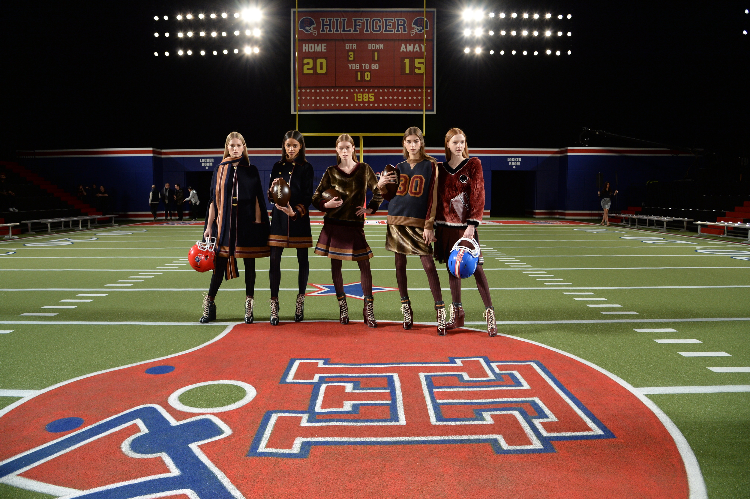  Models warming up for the big game on the runway. 