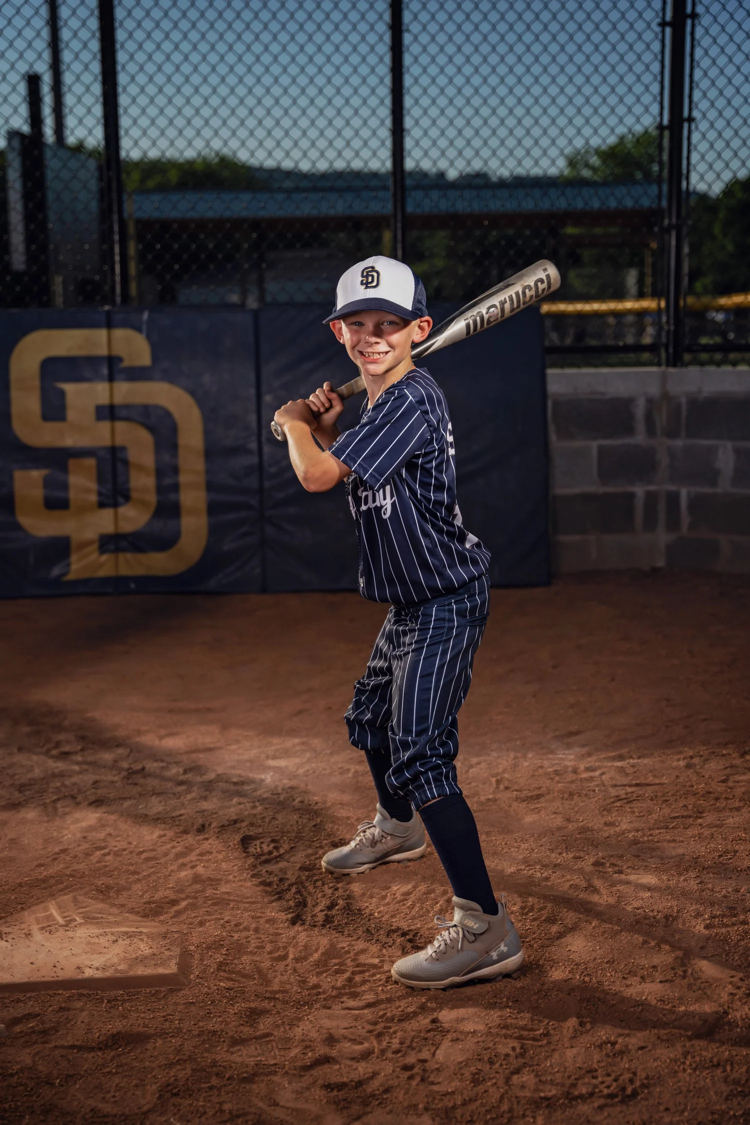 Youth baseball batter portrait on the field