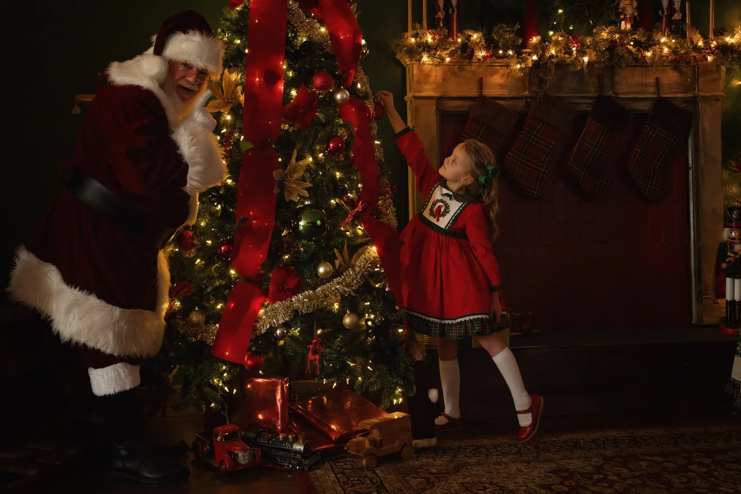 Child enjoying a Christmas Santa portrait experience