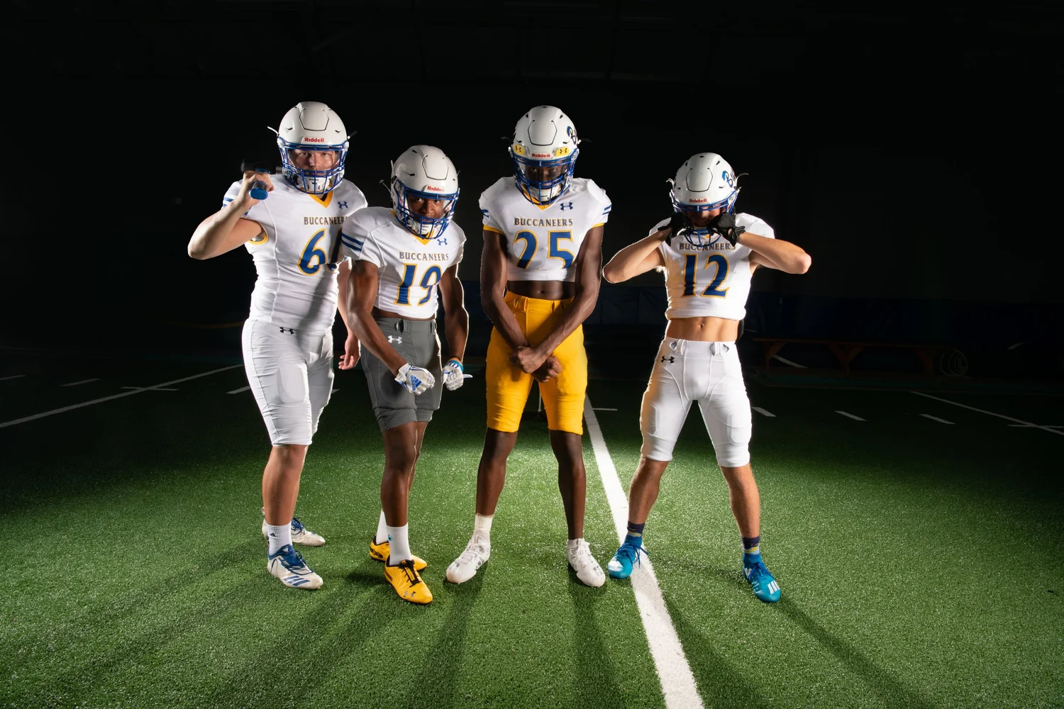 Chattanooga high school football players photographed together during a dramatic school media day