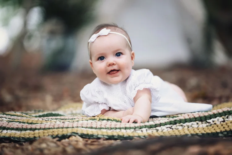 Smiling baby photographed during a Twilight experience