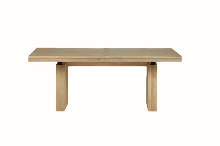 The Double extendible dining table by Ethnicraft in walnut is a successful combination of pure lines and a solid look.