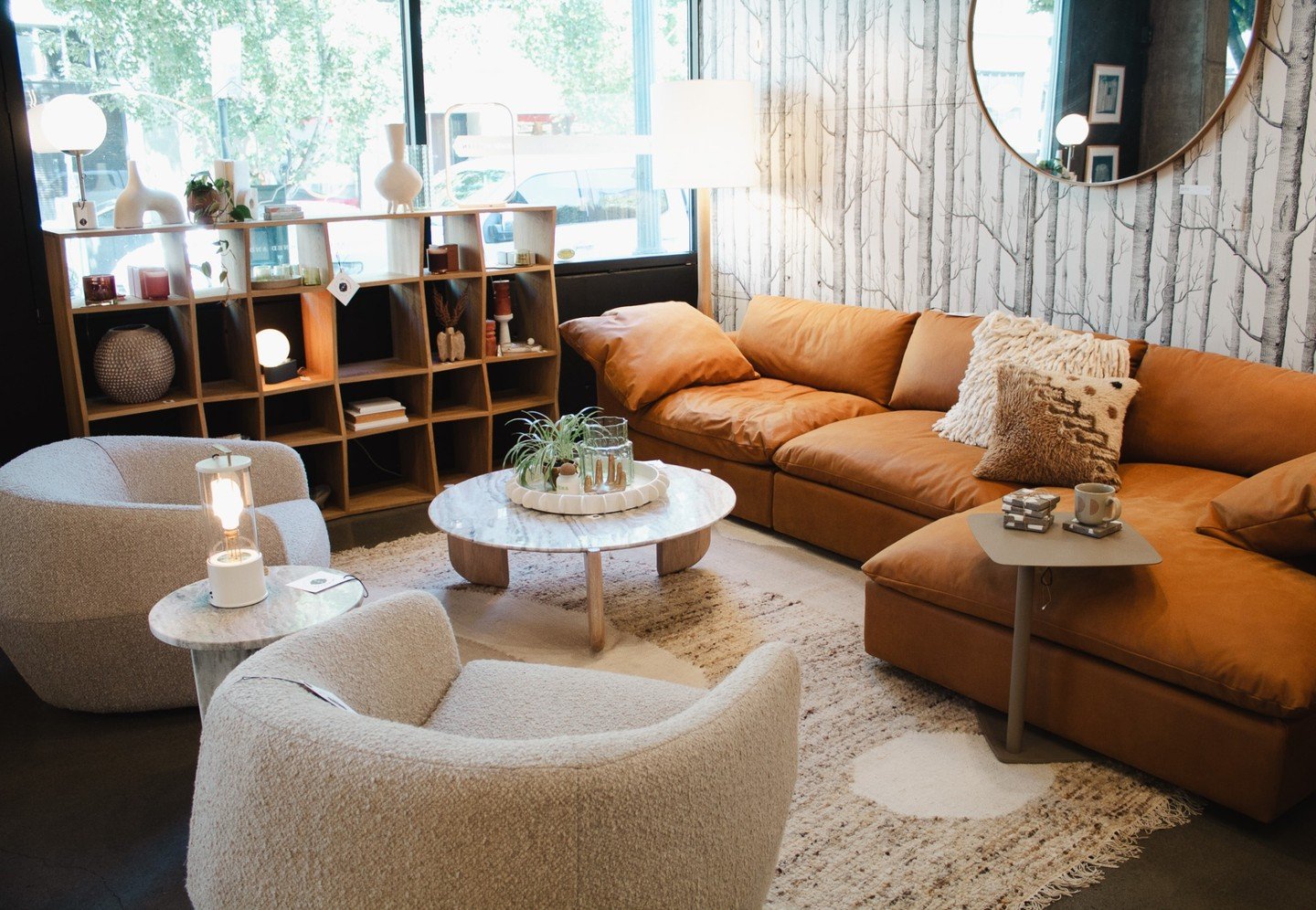 We're loving this cozy little corner of our showroom. Layered with warm wood tones, rich textures, and inviting finishes, it's a space designed to feel as comfortable as it is stylish. Stop by for inspiration and see how thoughtful details can transf