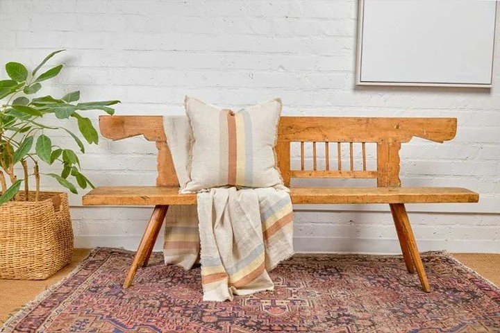 Pale natural tones and variegated striping make our signature heavyweight hand-loomed linen feel lit from within. Our new throw combines a gorgeous pale herringbone weave with lively stripes of darker flax, orange, yellow and light blue. Each edge is