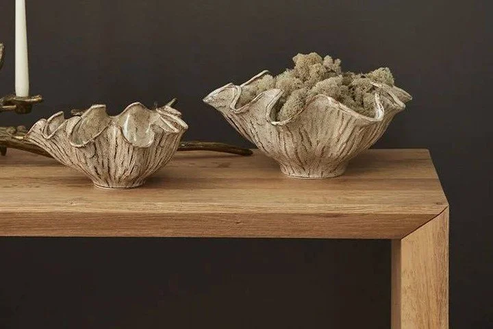 Ideal for autumn and harvest arrangements, tableware, or even as a sculptural object, this bowl collection brings artful warmth to the home. Available in two sizes, these ceramic bowls feature a glossy reactive glaze with beautiful tonal variations o