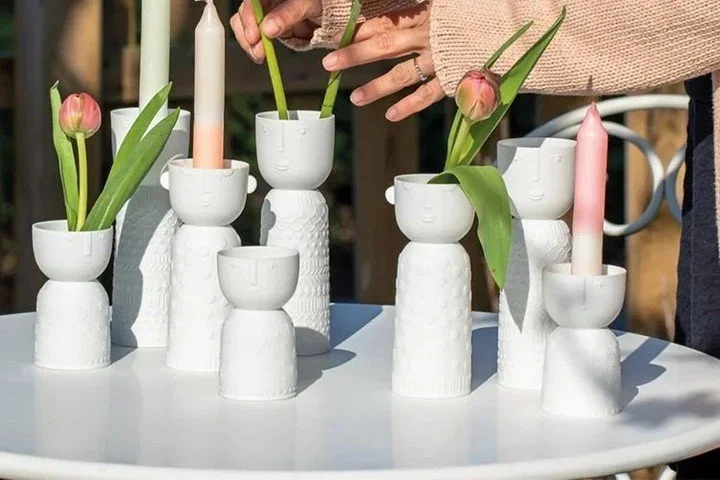 These porcelain vases shine with undeniable personality. Together, this family makes an unbeatable team. These vases accommodate large and small spaces for cut flowers, potted plants, and tealights. This family will bring personality to your favorite