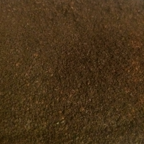 Fresh ground fine grind coffee for Manual Drip dark roast