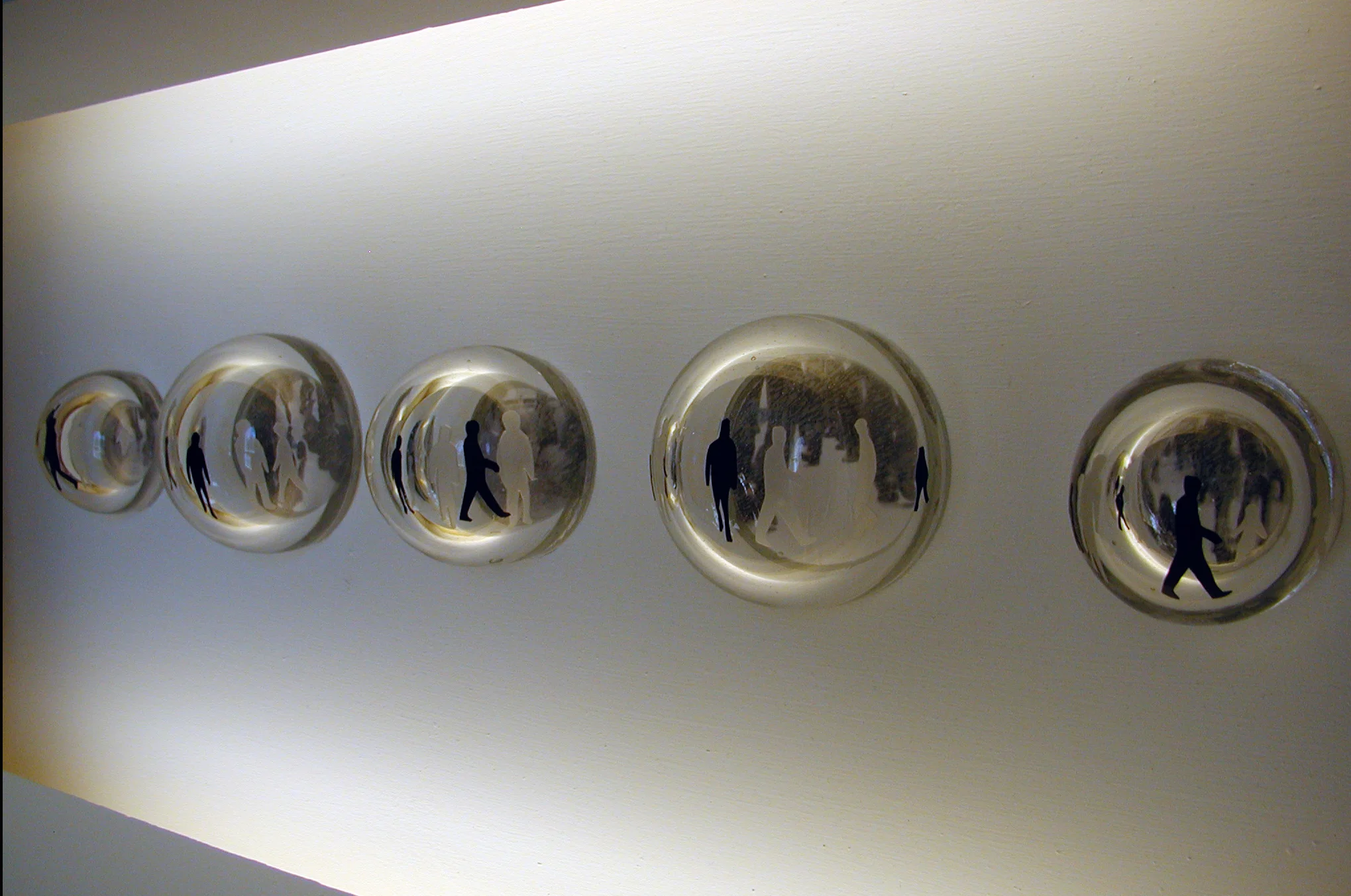 “Invisible” 2005, blown glass, sandblast, photo, wood, fluorescent lights, 30" x 54" x 8"