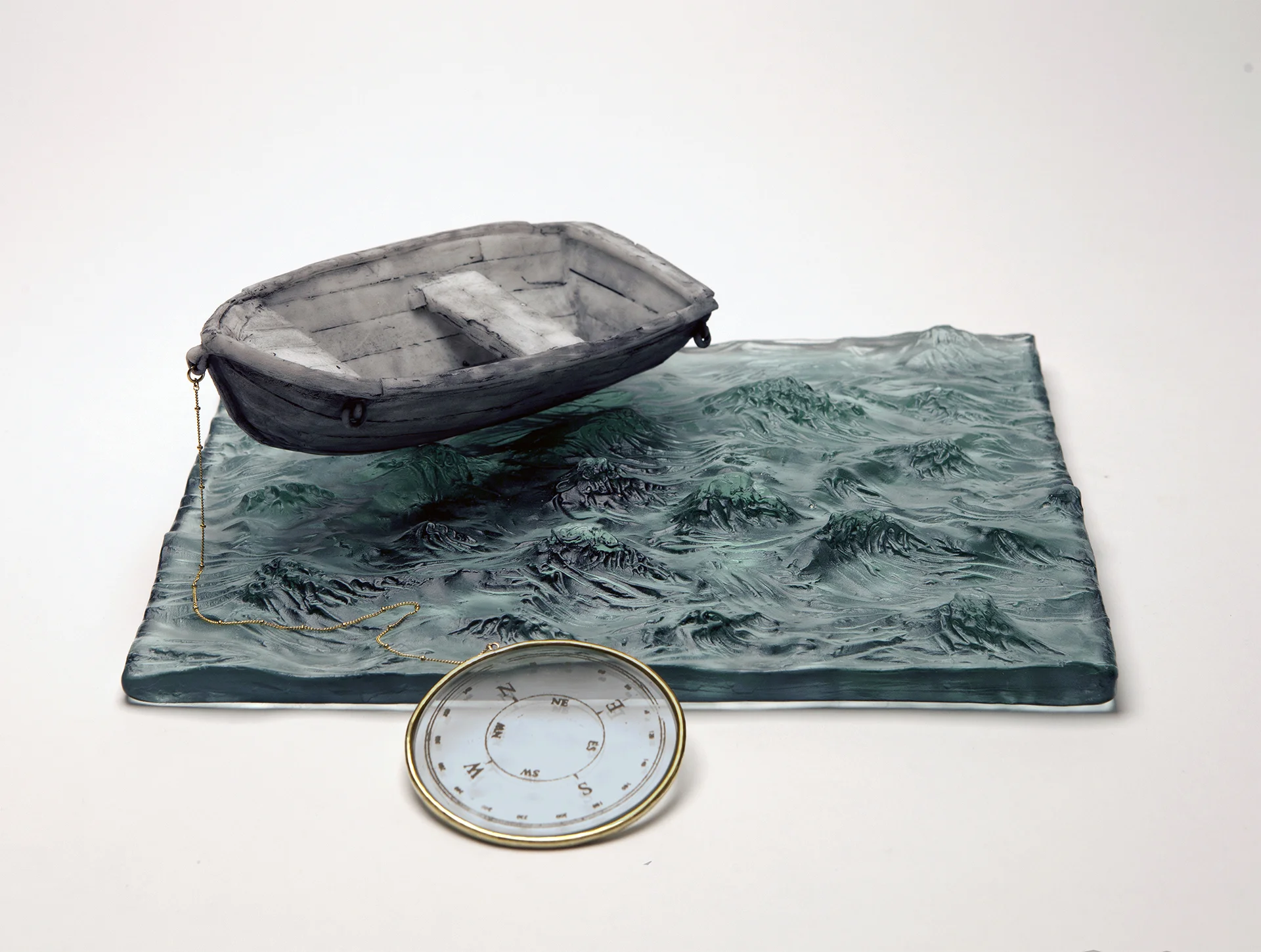 “Saudade” 2015, kiln cast glass, enamel, brass, 6” x 12” x 10”