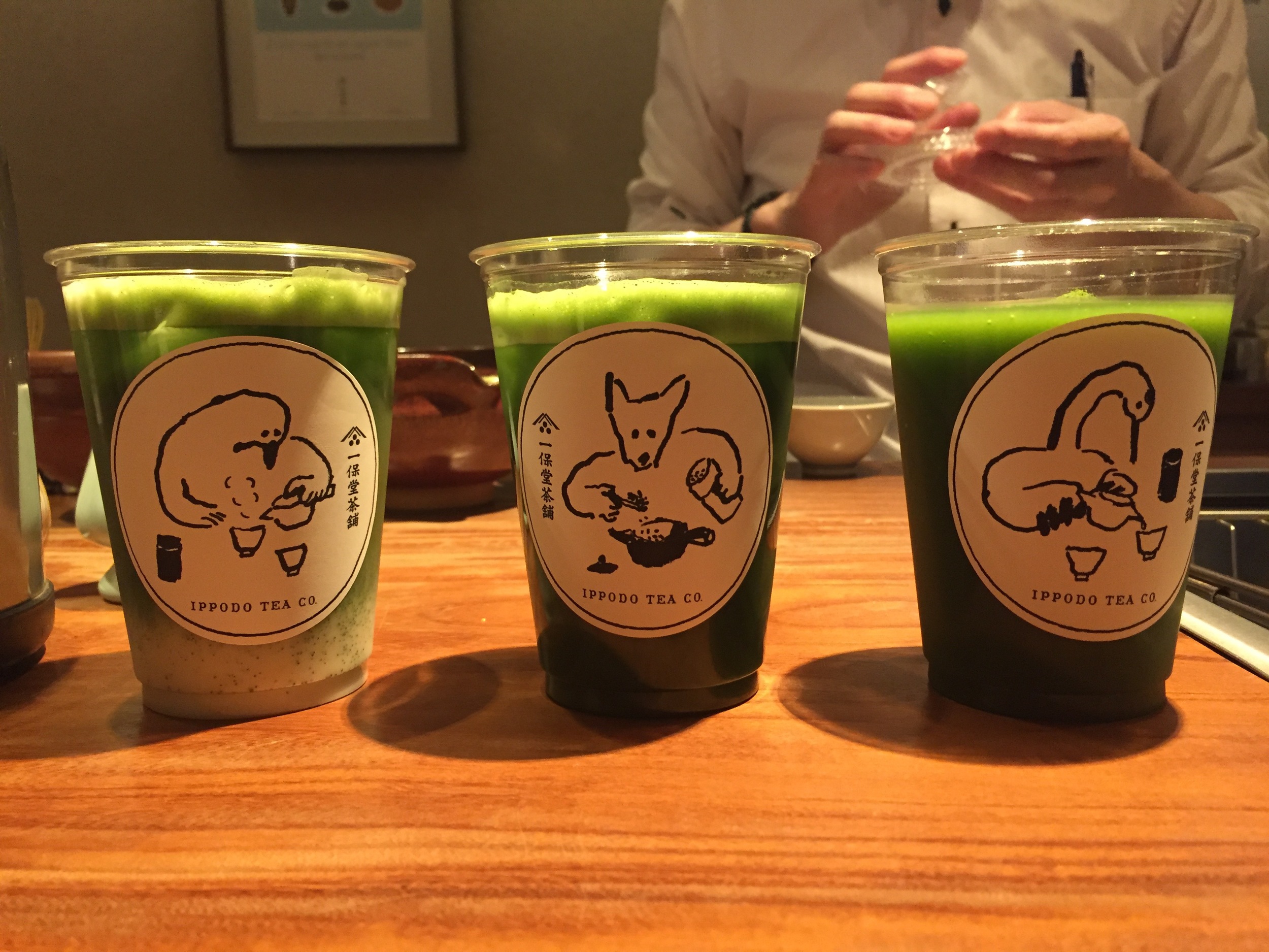 The slushy is the one on the far right. Yes, the one with the... what is that... a goose? It is hanging out with an iced matcha bear and matcha with almond milk... uh... other bird kind of thing. My super fancy thick matcha is not shown because it was already in my hands on its way to my face