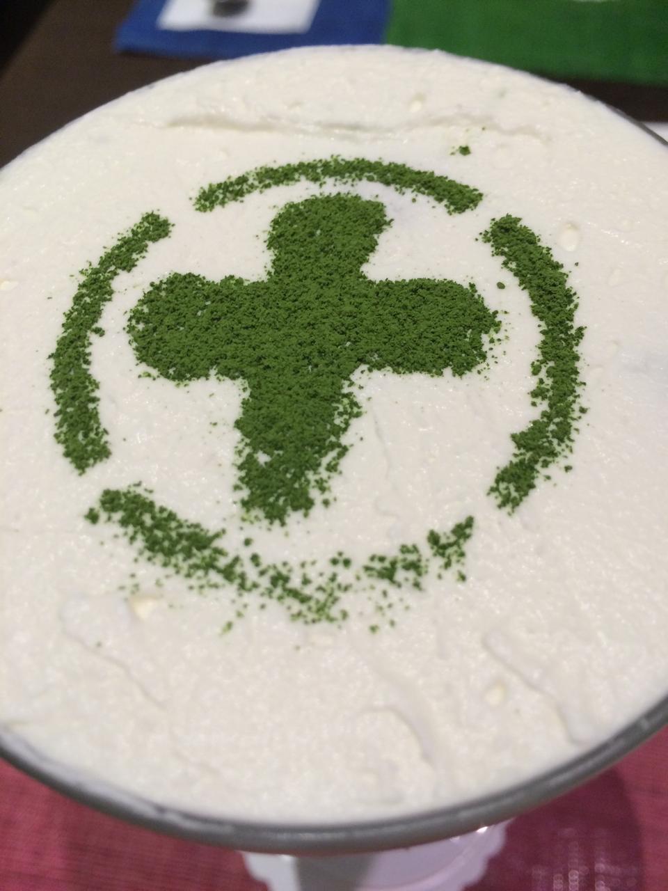 This is the cross you are looking for... but like on a wall or banner instead of on whipped cream