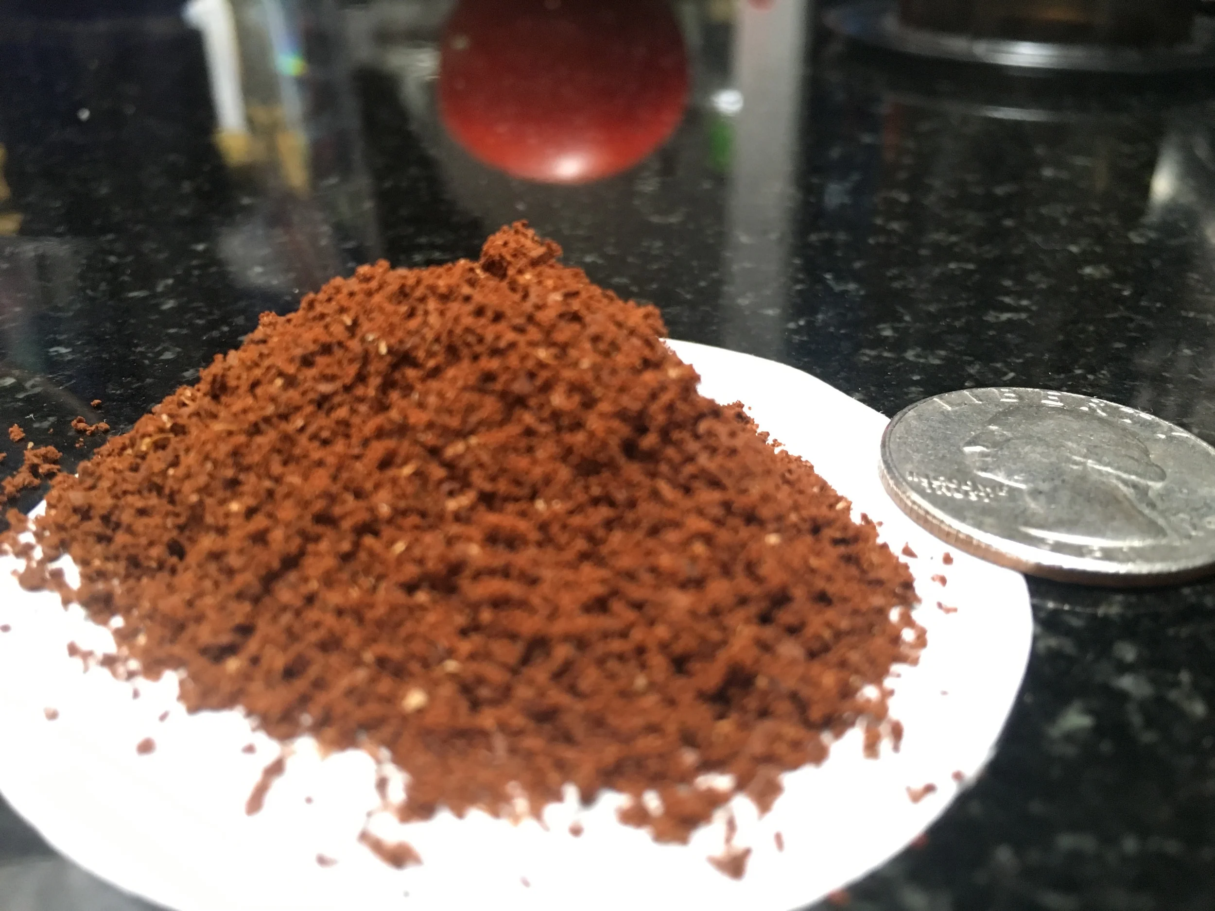 This is the grind size you are going for when you are done grinding. I don't know... People always show these pictures as if they are useful and I'm like who is able to get anything out of this? A quarter? Great. Thanks.