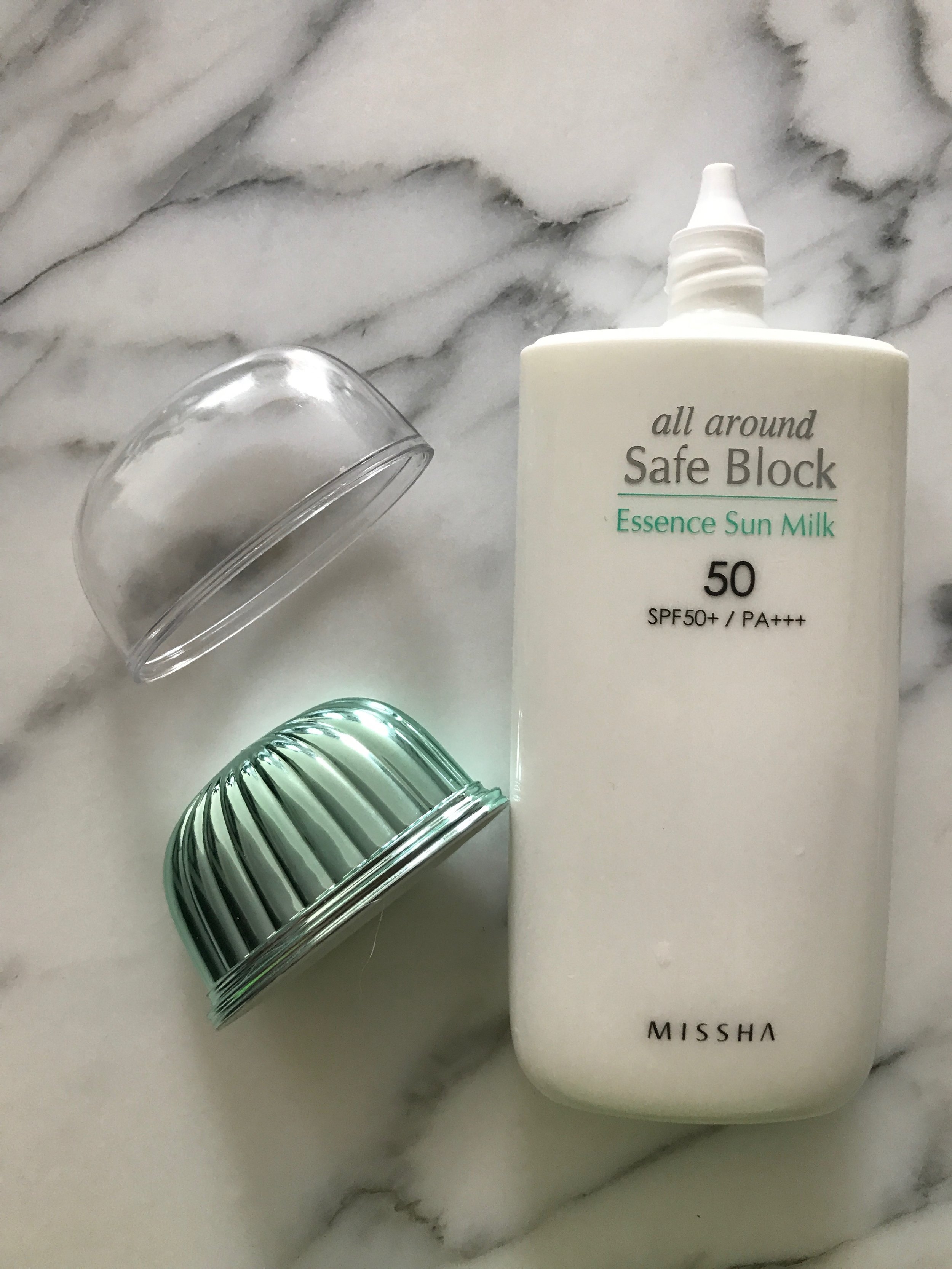 Uh oh. Very asymmetrical with cap number two removed. Don't worry, it is still the best sunblock for your face!