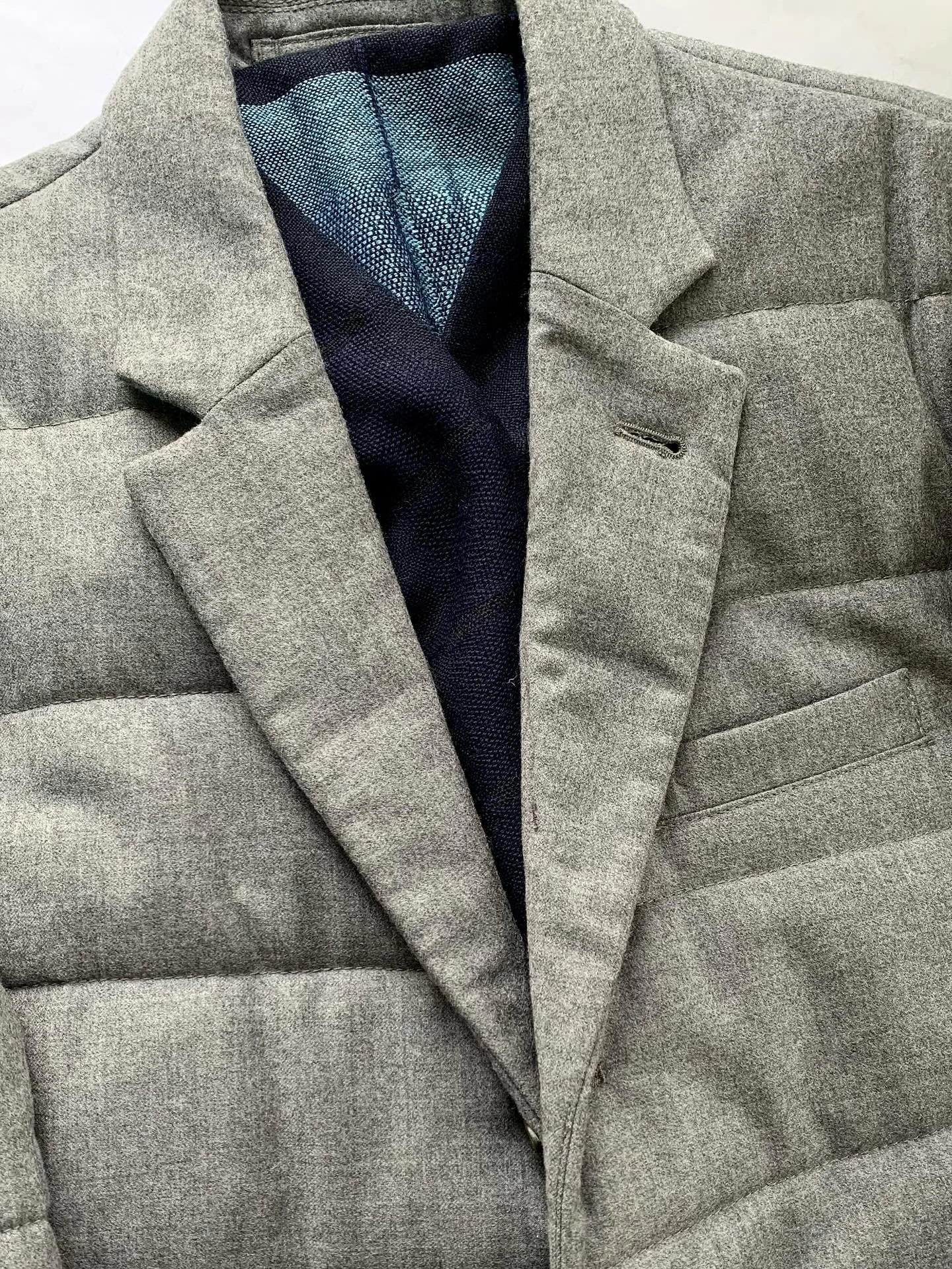 Lacoste gray puffer sport coat style outerwear, size L; blue color-block scarf from Novica.
@lacoste, @novica