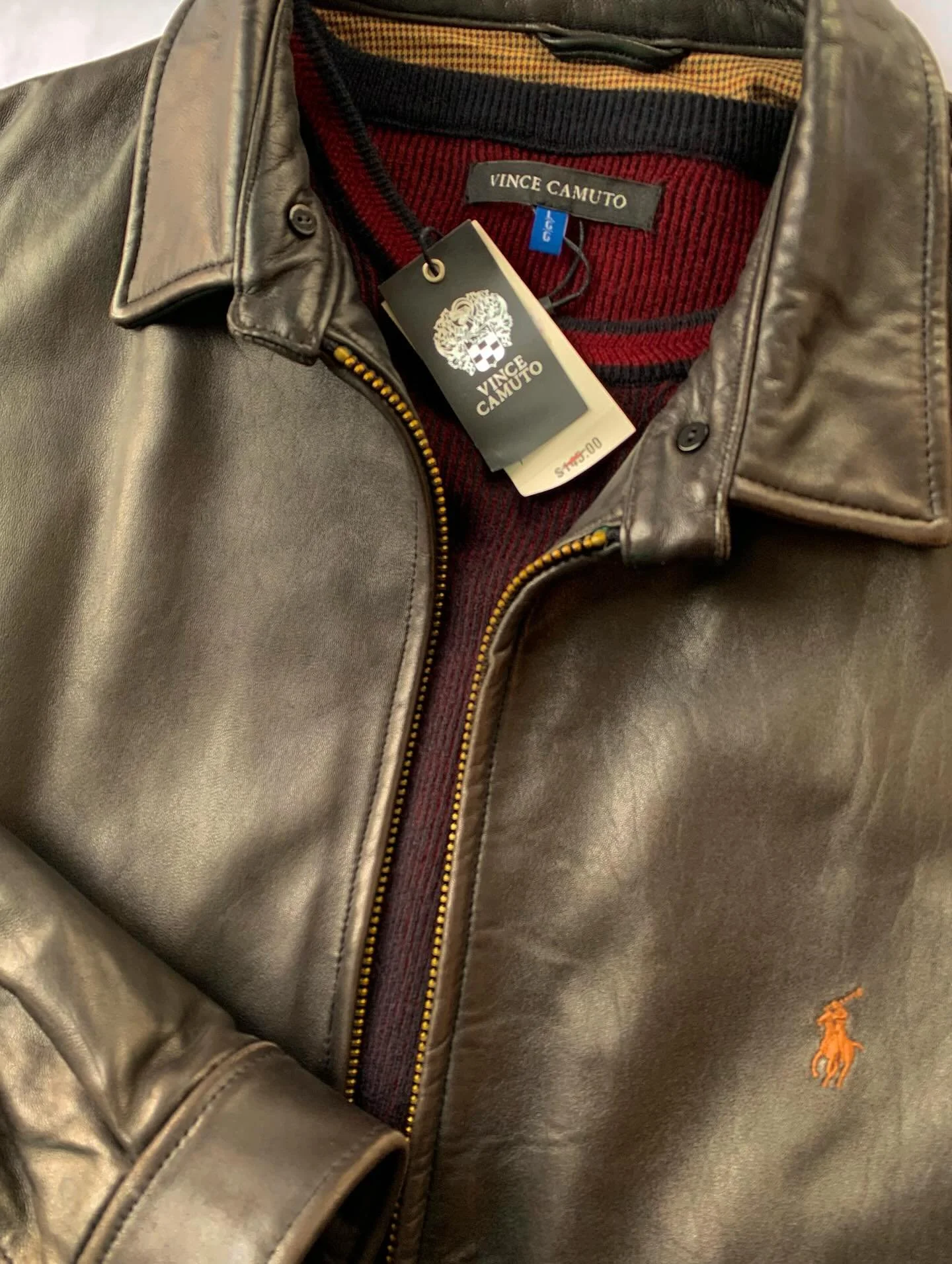 Ralph Lauren classic kona brown leather jacket, size XL; burgundy sweater from Vince Camuto, new with tag, size L.
@ralphlauren, @vincecamuto