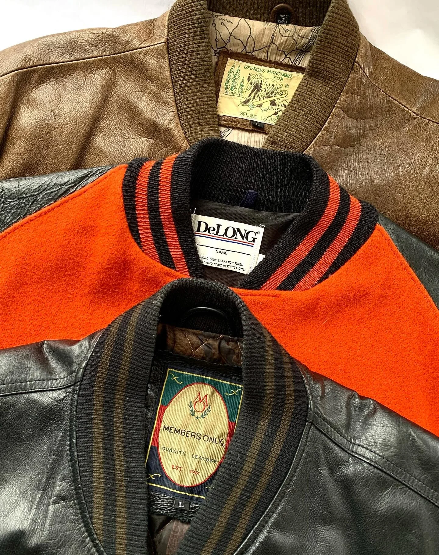 Vintage bomber jackets.
Guess brown leather, size L
DeLong varsity jacket, size M 
Members Only black leather, size L
