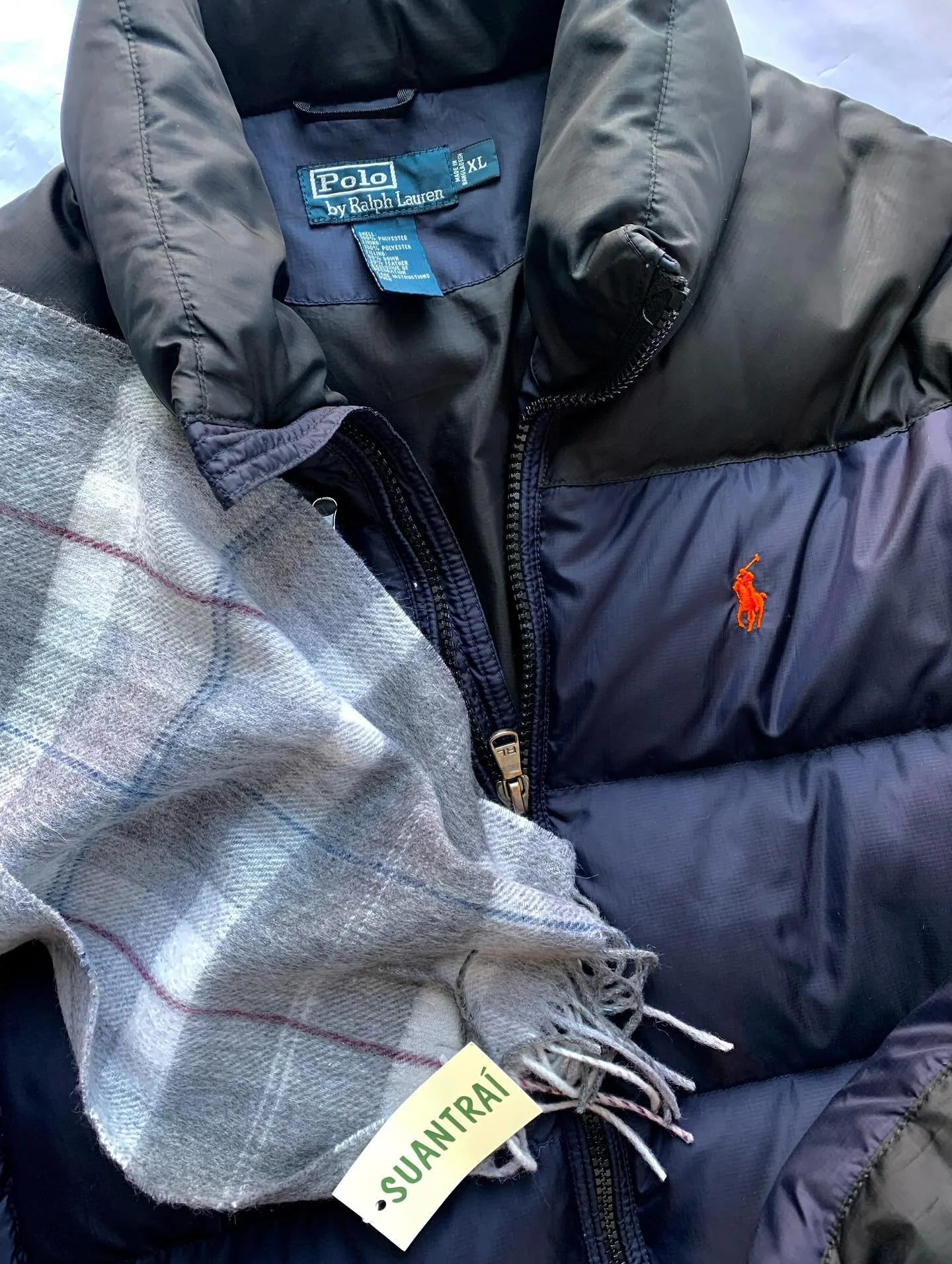 Ralph Lauren black and blue puffer jacket, size XL; lambswool scarf, new with tag, from Suantrai of Ireland.
@poloralphlauren