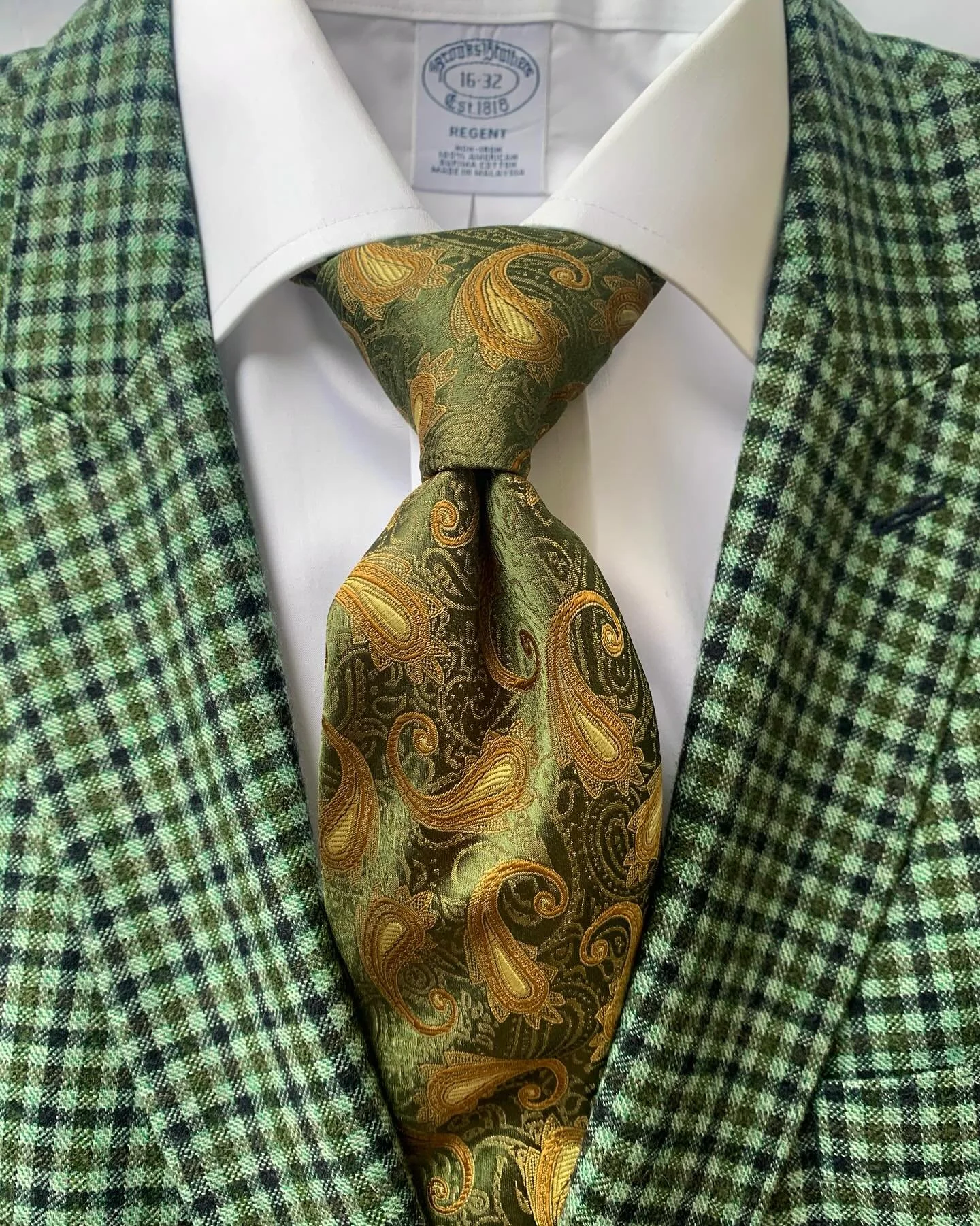 Marlane green plaid sport coat, size 48R: dress shirt from Brooks Brothers, size 16: necktie from Robert Talbott.
@brooksbrothers