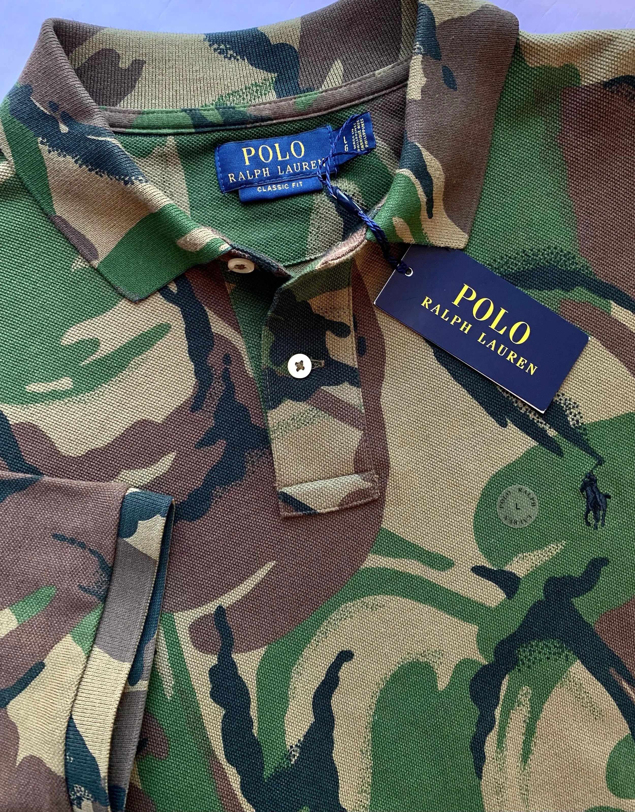 Ralph Lauren camo short sleeve polo shirt, new with tags, size L.
@poloralphlauren