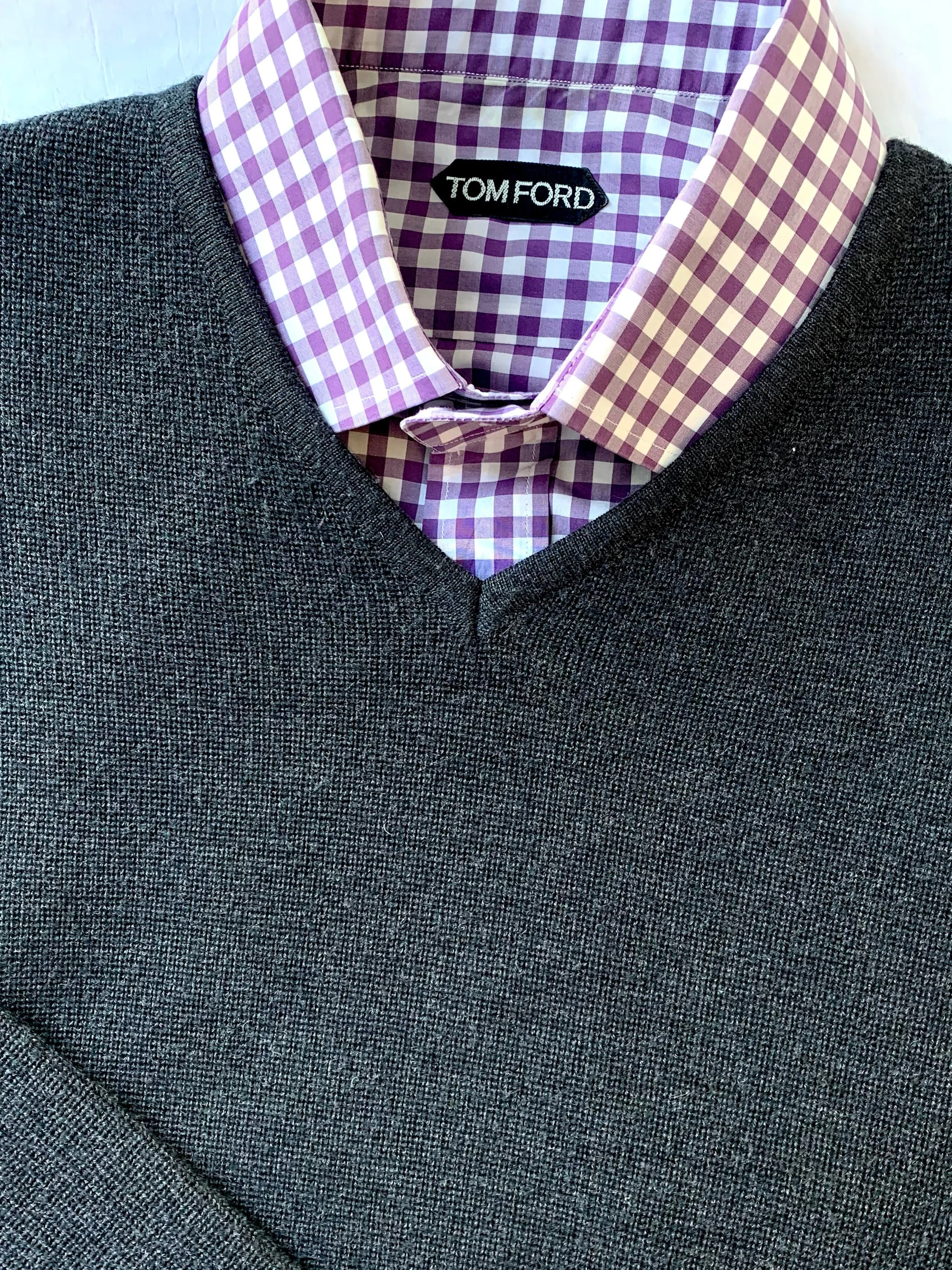 Barney&rsquo;s NY charcoal merino sweater, size L; Tom Ford purple gingham plaid long sleeve shirt, size 17.
@barneysman, @tomford