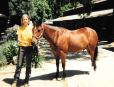  Sarah with "Shy Boy" at Flag Is Up Farm, 2001.