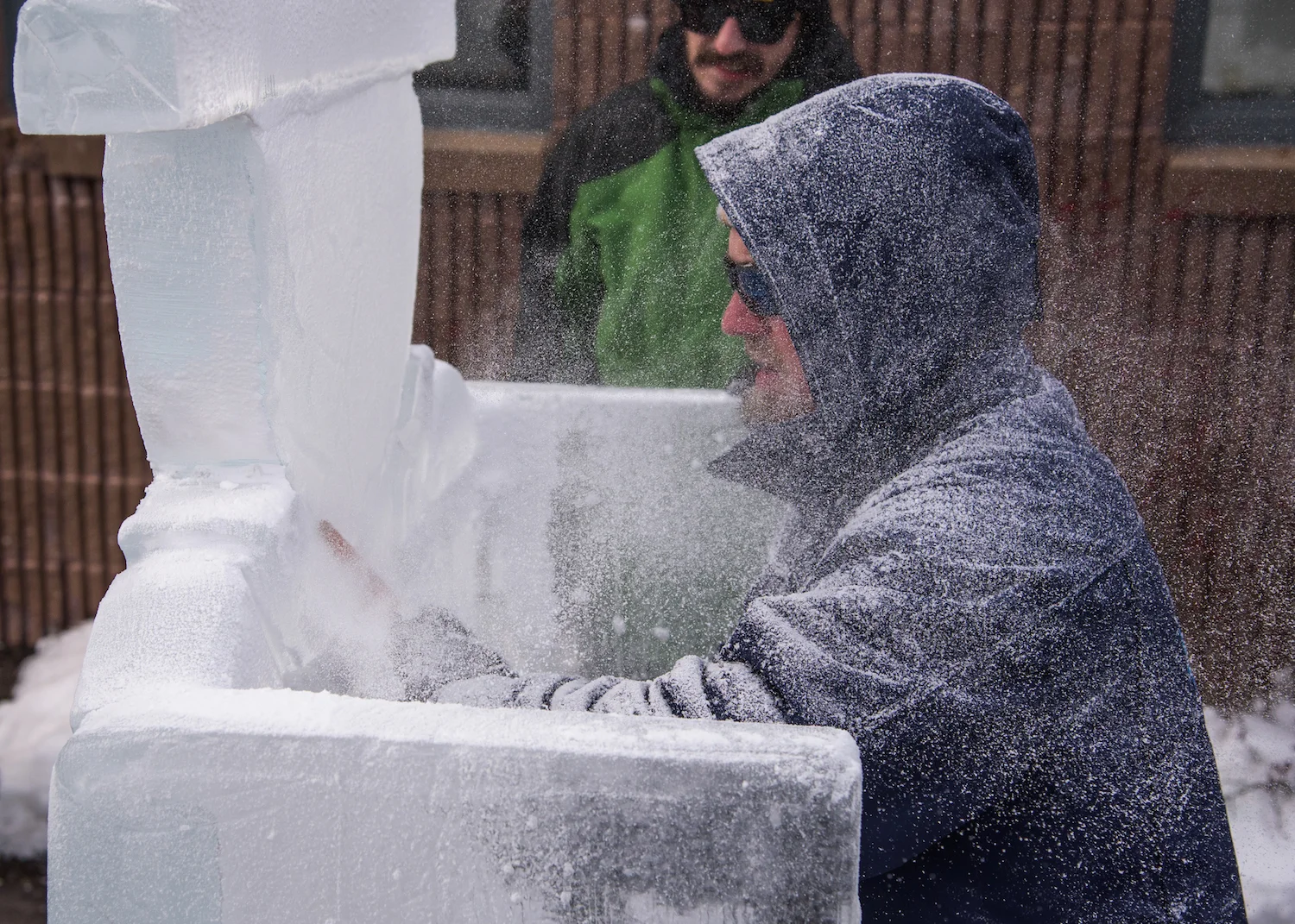 Jason Bluck of Sub Zero Ice Carvings custom-cuts a throne from a block of ice.