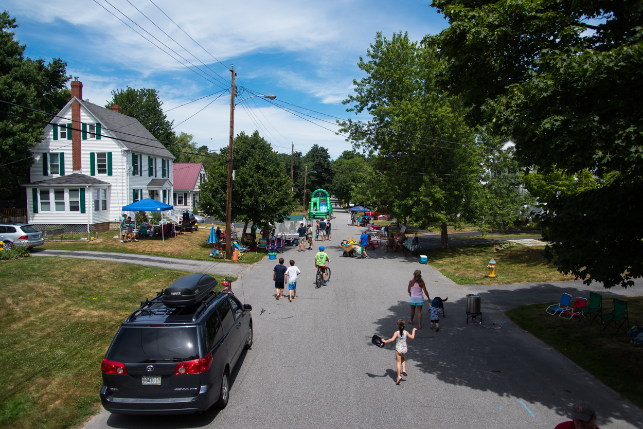 Residents in the Rosemont neighborhood of Portland make their way to a block party on Edwards Street Saturday, July 30, 2016.