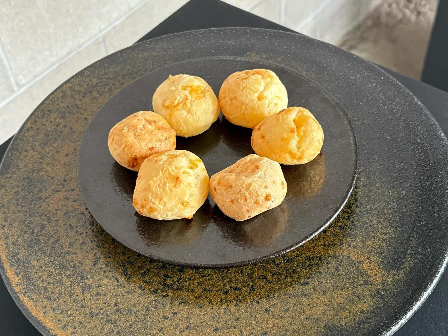 This week at the farmer&rsquo;s market we&rsquo;re featuring @brunascheesebread 
Perfectly golden and crispy on the outside, soft and flavorful on the inside &mdash; and it looks extra vibrant O&rsquo;baware&rsquo;s plate.✨

We&rsquo;ll be back this 