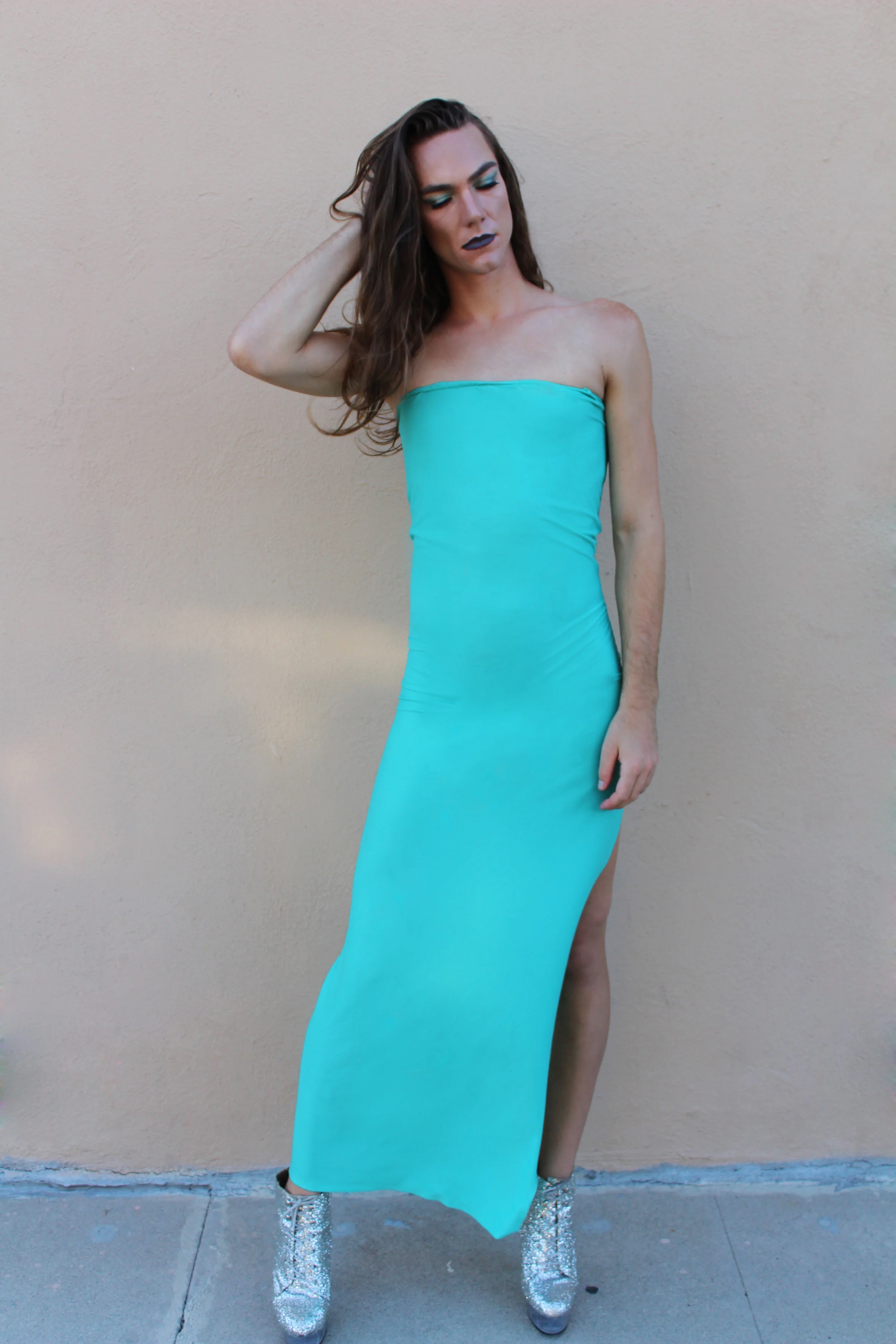 Photo by: Chloe Diaz Teal Pieces of Fabric & Metallic Booties to Make this Look Pop.