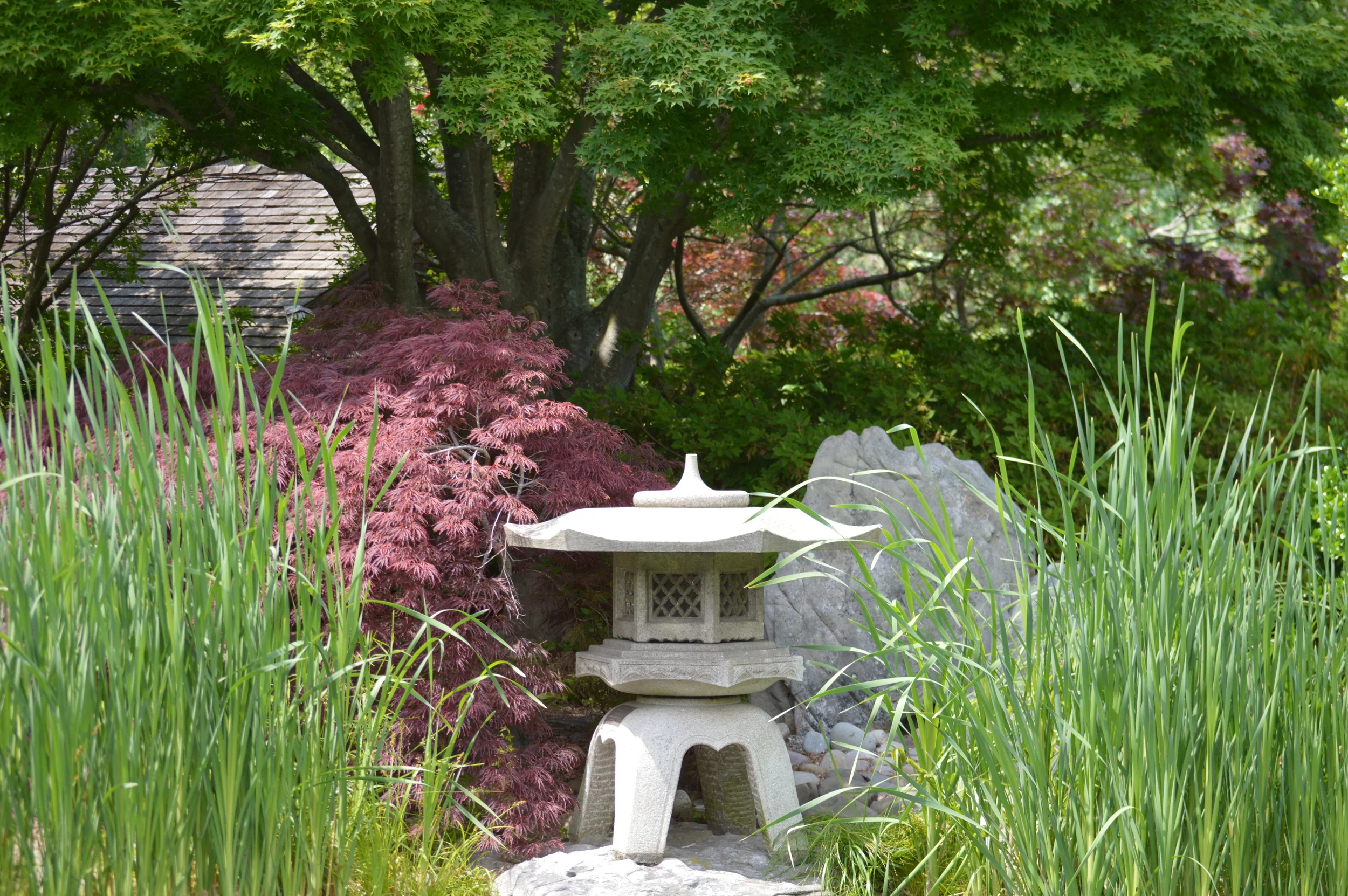 Japanese Stone Statue in the Norfolk Botanical Garden.