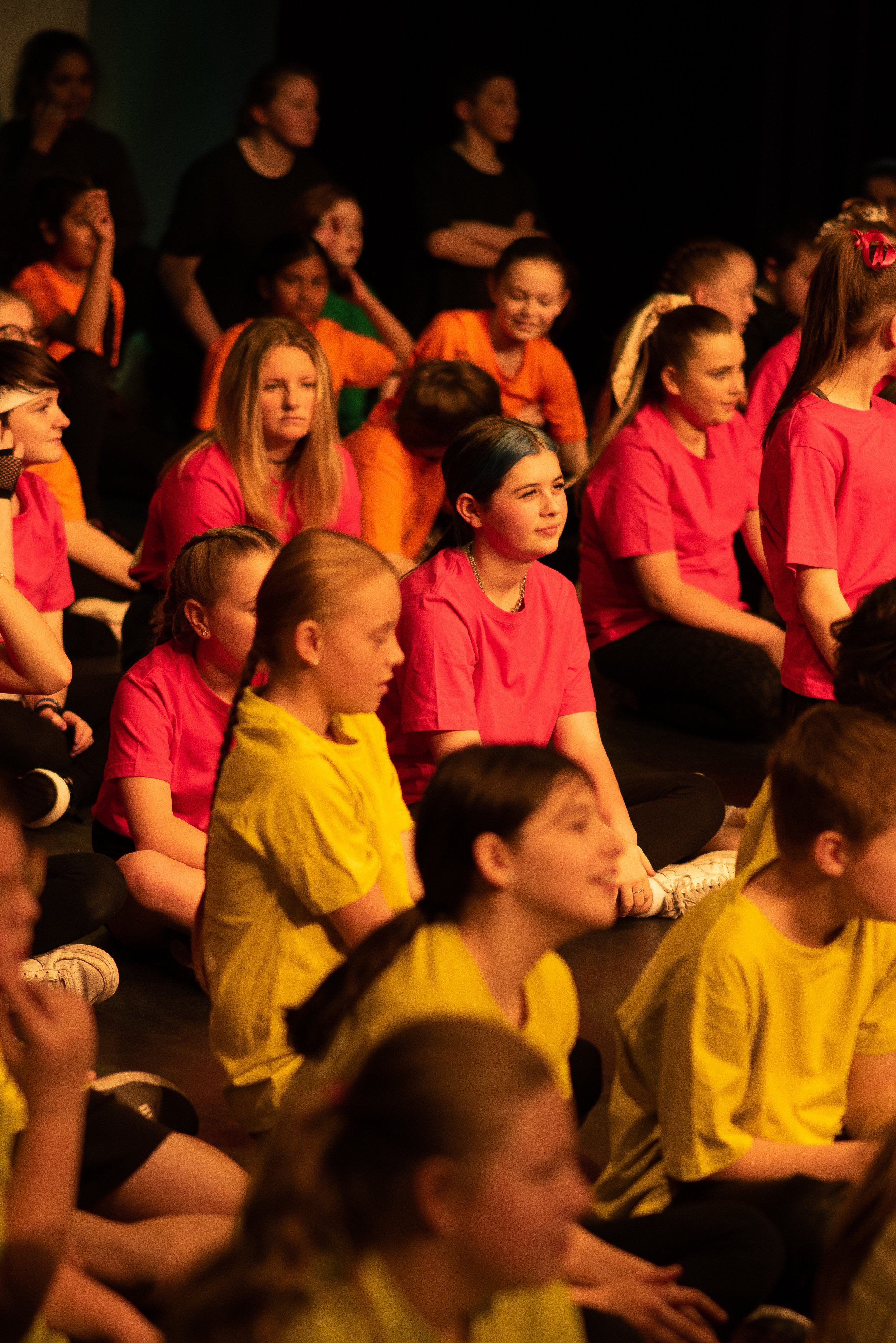 group of students form different schools sitting together