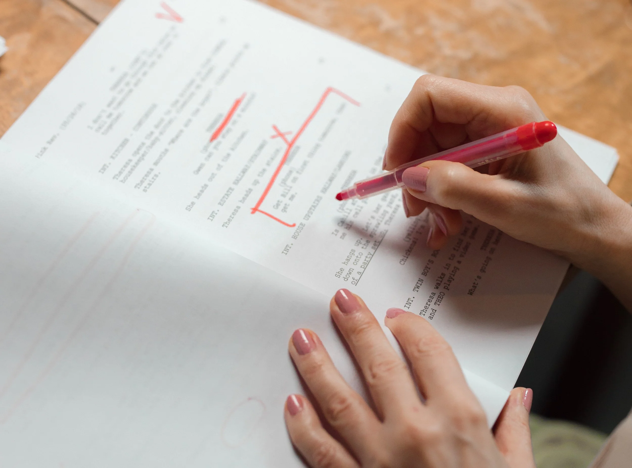 Editing with a red pen.